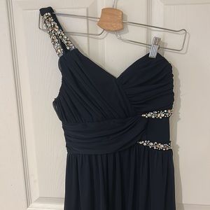Navy blue one shoulder prom dress.